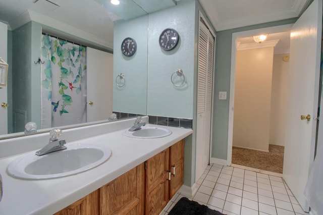 13947 Ashurst St, Livonia, MI 48154 - bathroom with crown molding, double vanity, tile patterned flooring, and a closet