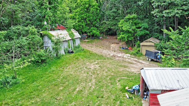 3618 Rohr Rd, Lake Orion, MI 48359 - view of green lawn featuring a storage unit
