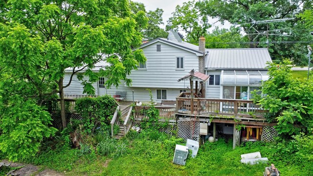 3618 Rohr Rd, Lake Orion, MI 48359 - back of house with a deck, stairway, and a metal roof