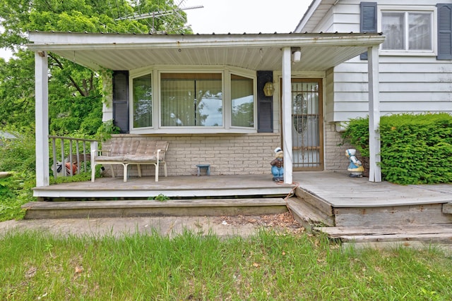 3618 Rohr Rd, Lake Orion, MI 48359 - doorway to property with brick siding