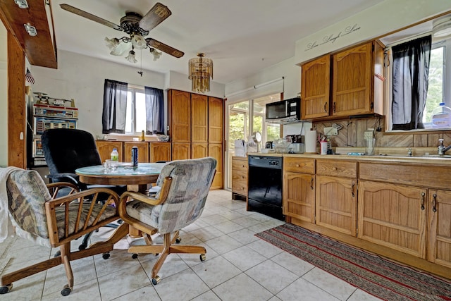 3618 Rohr Rd, Lake Orion, MI 48359 - kitchen with black appliances, light countertops, a ceiling fan, and brown cabinetry