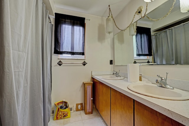 3618 Rohr Rd, Lake Orion, MI 48359 - bathroom featuring double vanity and tile patterned flooring