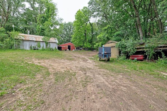3618 Rohr Rd, Lake Orion, MI 48359 - view of yard with an outbuilding and a pole building