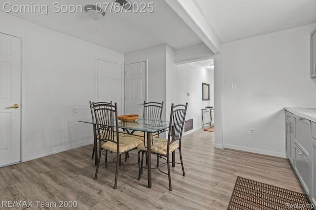 3277 9th St, Monroe, MI 48162 - dining area with light wood-style floors