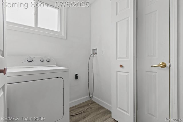 3277 9th St, Monroe, MI 48162 - laundry room with washer and dryer and light wood finished floors