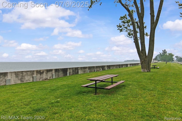 3277 9th St, Monroe, MI 48162 - view of home's community with a yard and a water view