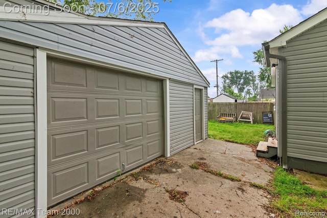 3277 9th St, Monroe, MI 48162 - garage featuring driveway