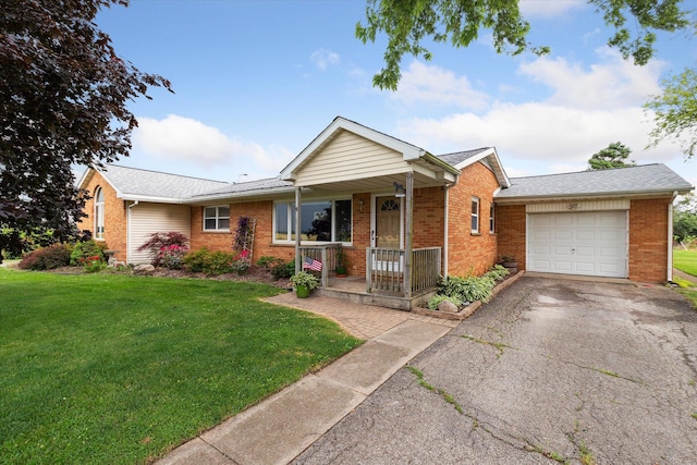 200 Begole Rd, Milan, MI 48160 - ranch-style house with covered porch, brick siding, a garage, a front yard, and asphalt driveway