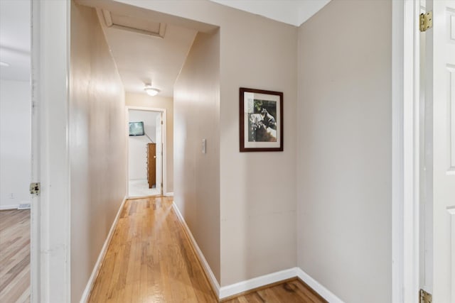 200 Begole Rd, Milan, MI 48160 - hallway with attic access and light wood-style floors