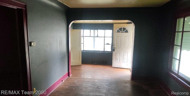 3505 Herrick St, Flint, MI 48503 - hall featuring arched walkways and wood finished floors