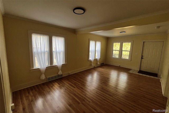 2613 Flushing Rd, Flushing, MI 48504 - spare room with ornamental molding and wood finished floors