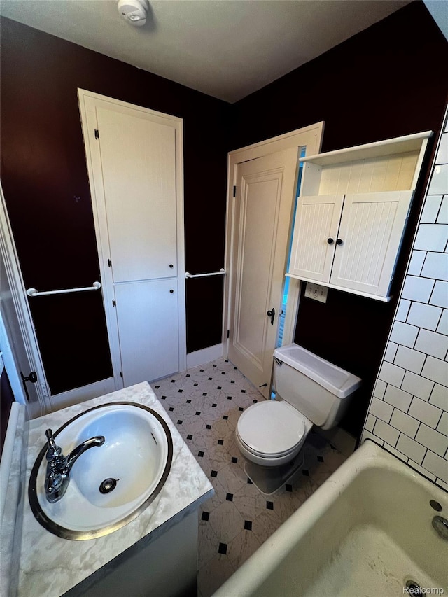 2613 Flushing Rd, Flushing, MI 48504 - full bathroom with vanity and a tub to relax in