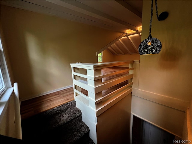 2613 Flushing Rd, Flushing, MI 48504 - staircase with wood finished floors and lofted ceiling