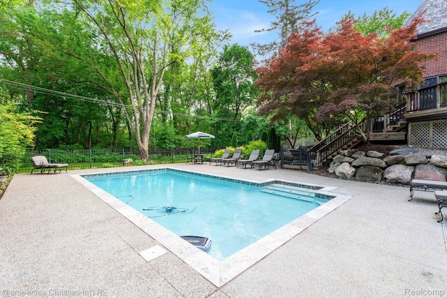 633 Hawthorne St, Birmingham, MI 48009 - view of swimming pool featuring stairway, a patio, and view of scattered trees