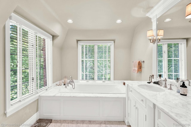 633 Hawthorne St, Birmingham, MI 48009 - bathroom with healthy amount of natural light, vanity, a bath, recessed lighting, and a chandelier