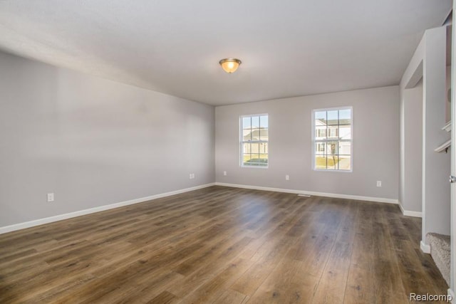 146 Woodland Way, Manchester, MI 48158 - spare room with dark wood finished floors and baseboards
