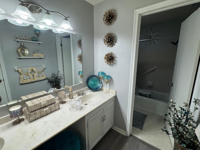2008 Beekman Ct, Flushing, MI 48532 - bathroom with vanity, wood finished floors, and shower / tub combination