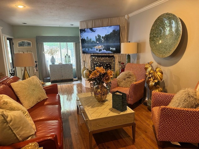 2008 Beekman Ct, Flushing, MI 48532 - living room with hardwood / wood-style floors, ornamental molding, and a fireplace