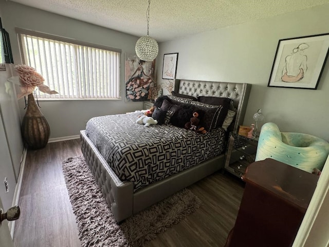 2008 Beekman Ct, Flushing, MI 48532 - bedroom with a textured ceiling and wood finished floors