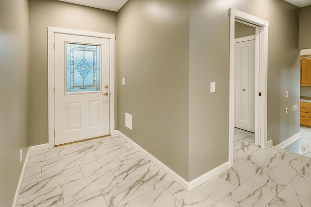 238 Cooks Lndg, Michigan Center, MI 49254 - entrance foyer featuring light marble finish floors and baseboards
