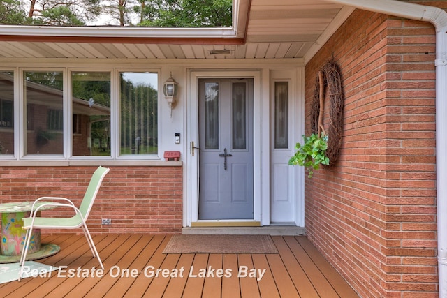 1360 Delta Dr, Saginaw, MI 48638 - doorway to property featuring brick siding