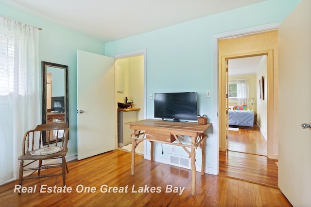 1360 Delta Dr, Saginaw, MI 48638 - home office featuring wood finished floors