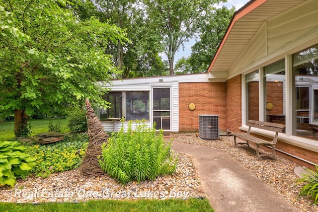 1360 Delta Dr, Saginaw, MI 48638 - property entrance featuring brick siding