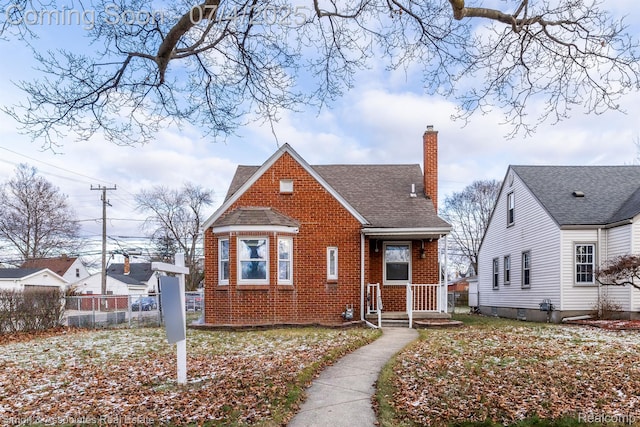 3101 Roosevelt St, Dearborn, MI 48124 - bungalow-style home featuring brick siding, a chimney, and a shingled roof