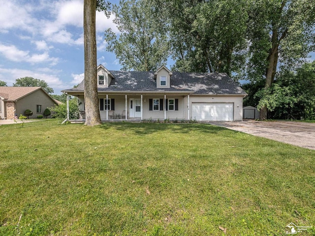 8299 Galloway Dr, Lambertville, MI 48144 - cape cod home with a porch, driveway, an attached garage, a front lawn, and a storage unit