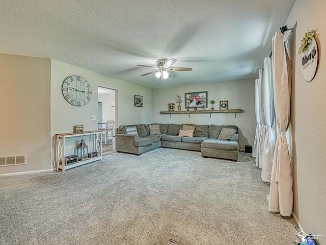 8299 Galloway Dr, Lambertville, MI 48144 - living area with carpet floors, a ceiling fan, and a textured ceiling