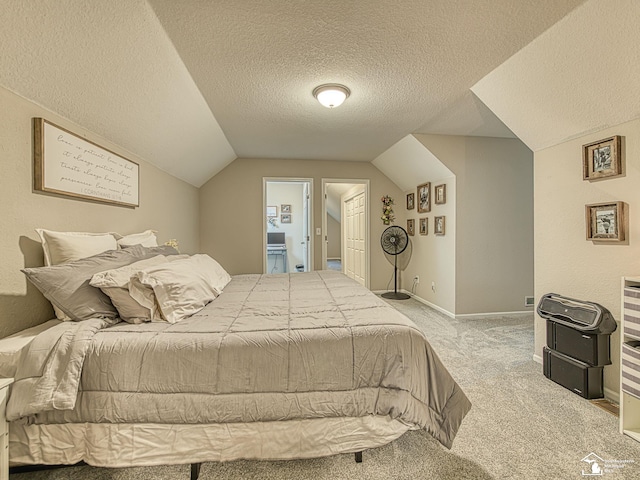 8299 Galloway Dr, Lambertville, MI 48144 - bedroom featuring a textured ceiling, carpet floors, lofted ceiling, and ensuite bath
