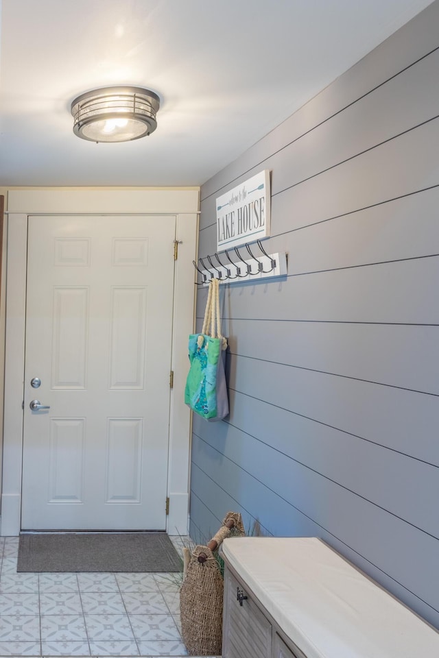 464 Kalamazoo St, South Haven, MI 49090 - mudroom with wood walls and light flooring