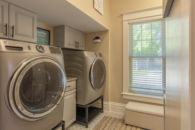 464 Kalamazoo St, South Haven, MI 49090 - laundry room with independent washer and dryer and cabinet space