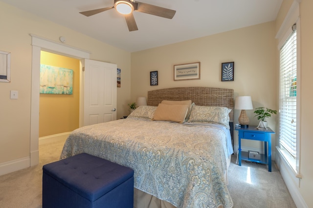 464 Kalamazoo St, South Haven, MI 49090 - carpeted bedroom featuring multiple windows and a ceiling fan