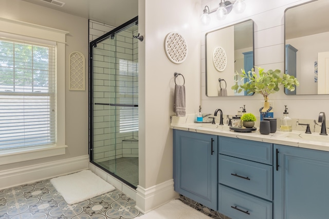 464 Kalamazoo St, South Haven, MI 49090 - full bath featuring a stall shower, tile patterned flooring, and double vanity