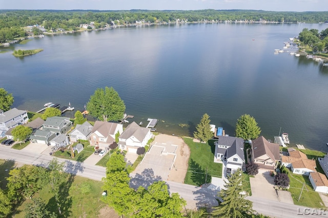 6820 Devils Lake Hwy, Manitou Beach, MI 49253 - aerial view of residential area featuring a nearby body of water