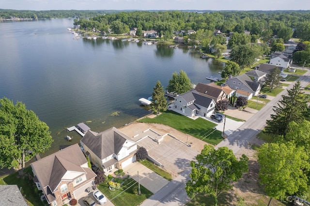 6820 Devils Lake Hwy, Manitou Beach, MI 49253 - aerial perspective of suburban area with a nearby body of water