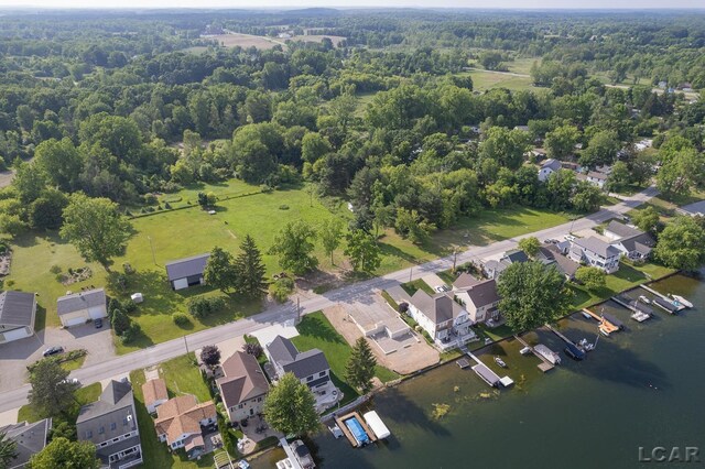 6820 Devils Lake Hwy, Manitou Beach, MI 49253 - aerial view of property and surrounding area featuring a large body of water and nearby suburban area