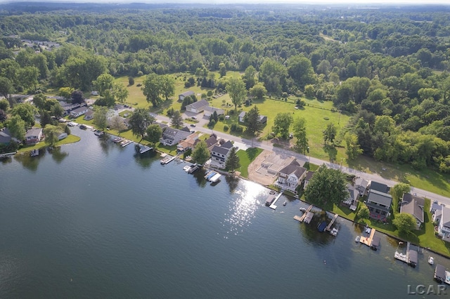 6820 Devils Lake Hwy, Manitou Beach, MI 49253 - aerial view of property and surrounding area featuring a large body of water and nearby suburban area