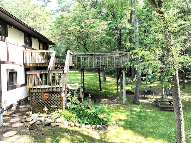 11589 Lombardy Ct, Pinckney, MI 48169 - view of grassy yard featuring a wooden deck and stairway