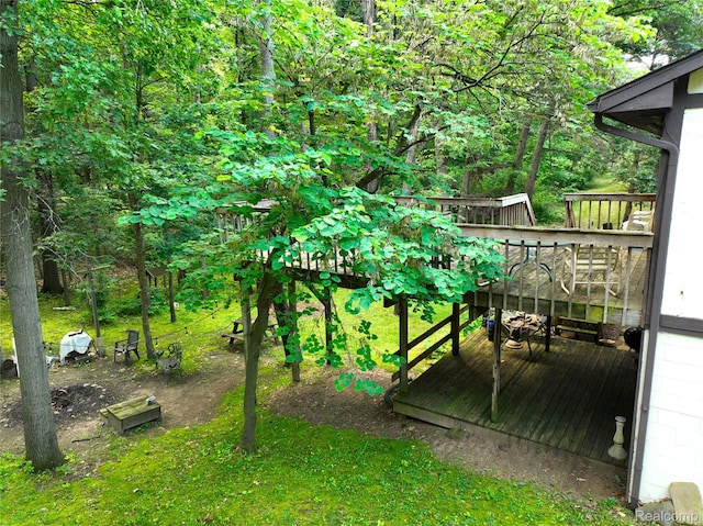 11589 Lombardy Ct, Pinckney, MI 48169 - view of yard featuring a wooden deck