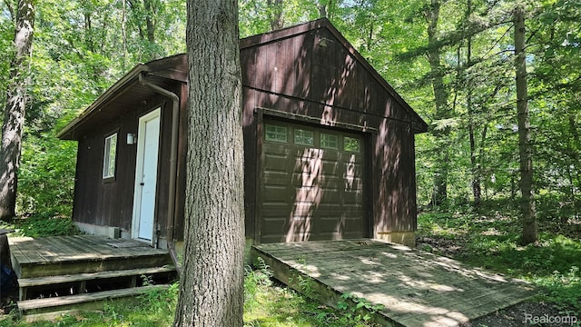 11589 Lombardy Ct, Pinckney, MI 48169 - view of outdoor structure with a forest view
