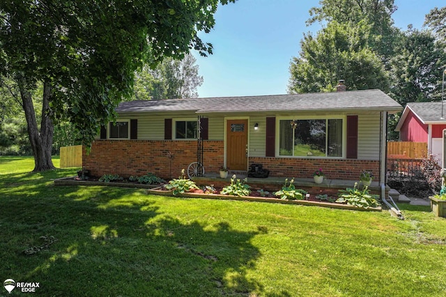 7226 Junction Rd, Frankenmuth, MI 48722 - ranch-style home with brick siding and a chimney