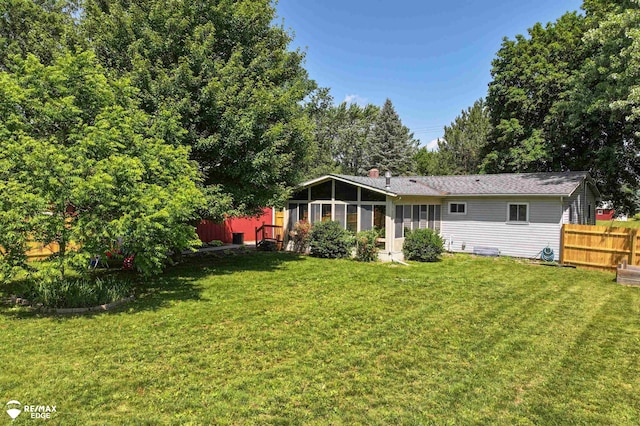 7226 Junction Rd, Frankenmuth, MI 48722 - rear view of property with a sunroom