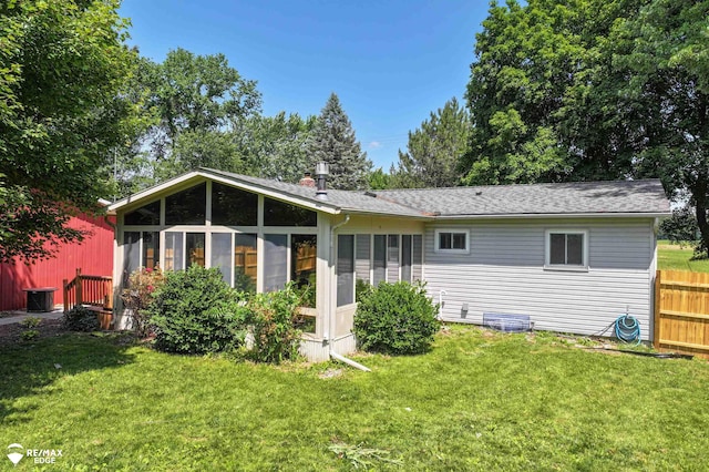 7226 Junction Rd, Frankenmuth, MI 48722 - rear view of house with a sunroom