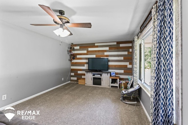 7226 Junction Rd, Frankenmuth, MI 48722 - carpeted living room with a ceiling fan and baseboards