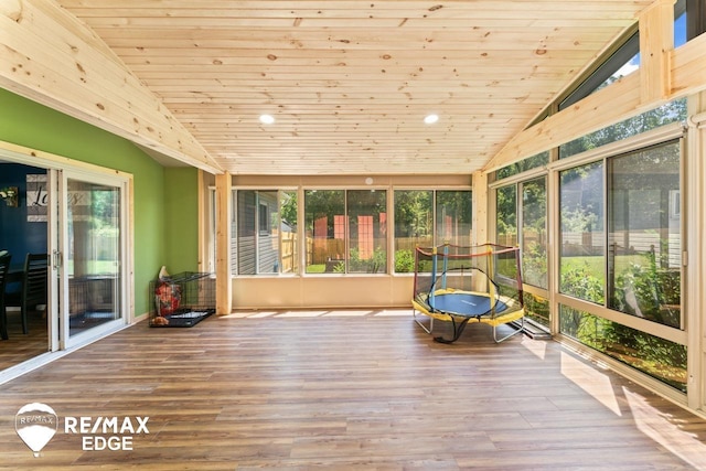 7226 Junction Rd, Frankenmuth, MI 48722 - unfurnished sunroom with lofted ceiling, wooden ceiling, wood finished floors, and recessed lighting