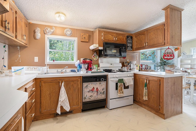 405 W Osborne Rd, Delton, MI 49046 - kitchen with black appliances, a textured ceiling, brown cabinetry, light countertops, and crown molding