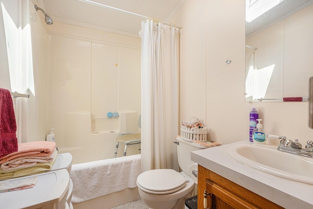 405 W Osborne Rd, Delton, MI 49046 - full bathroom with vanity, shower / bathtub combination with curtain, and a skylight