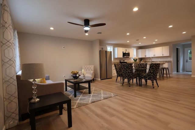 424 Doris St, Quincy, MI 49082 - dining room featuring light wood-style flooring, recessed lighting, and a ceiling fan